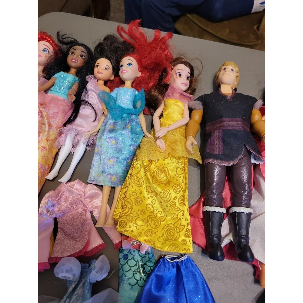 Disney Barbie dolls with extra dresses shoes etc... Mixed lot